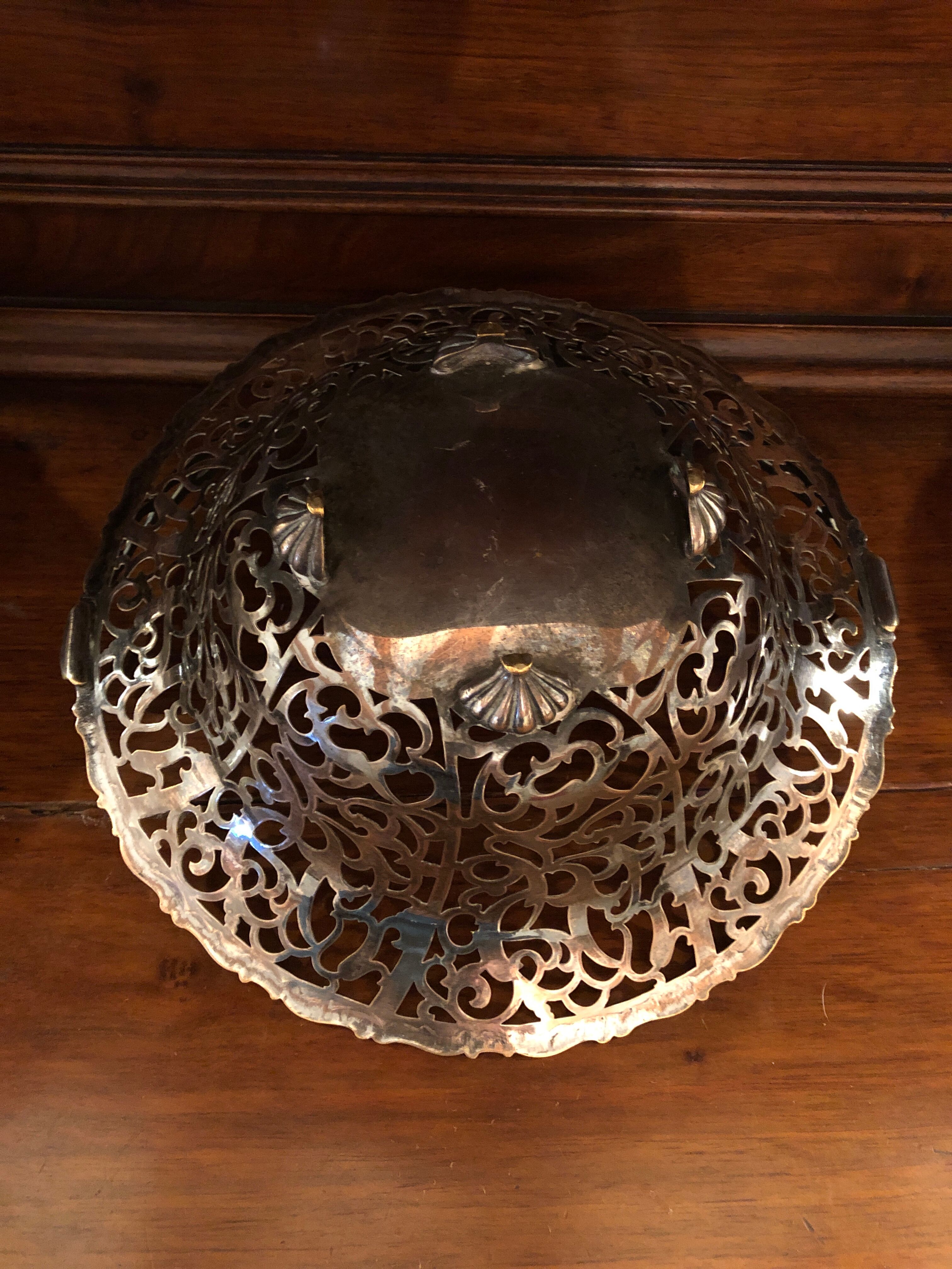 Open silver metal fruit basket