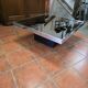 Chrome coffee table with smoked mirror top