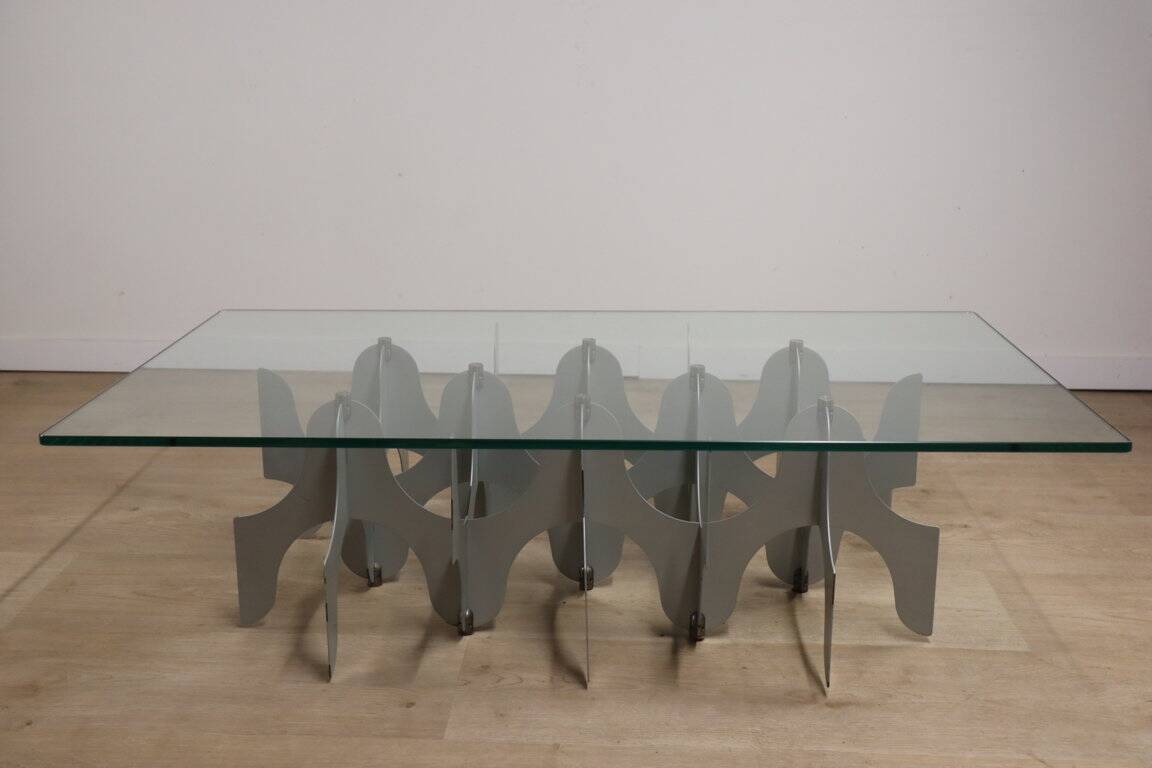 Minimalist sculptural coffee table in metal and glass