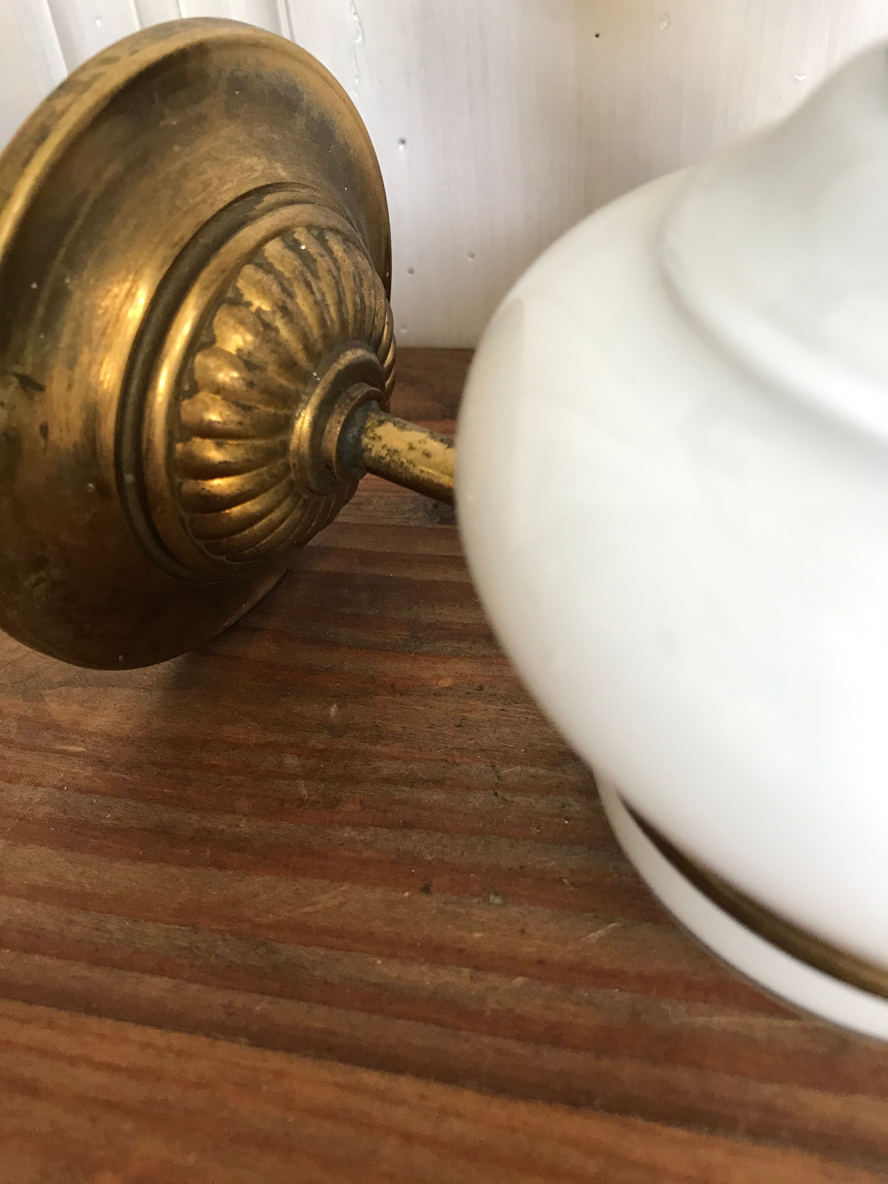Pair of brass and opaline sconces