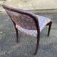 Scandinavian chair in curved solid teak wood and fabric.