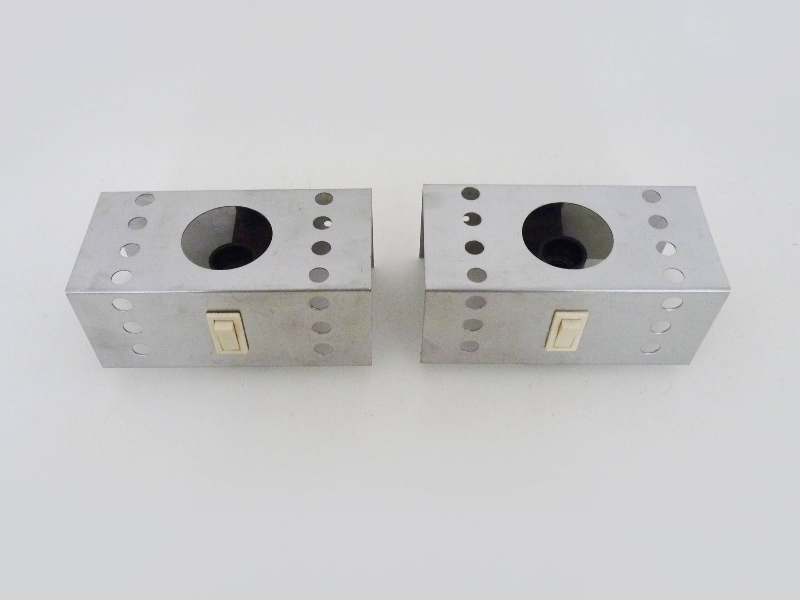 Pair of vintage chrome stainless steel wall sconces. Space Age