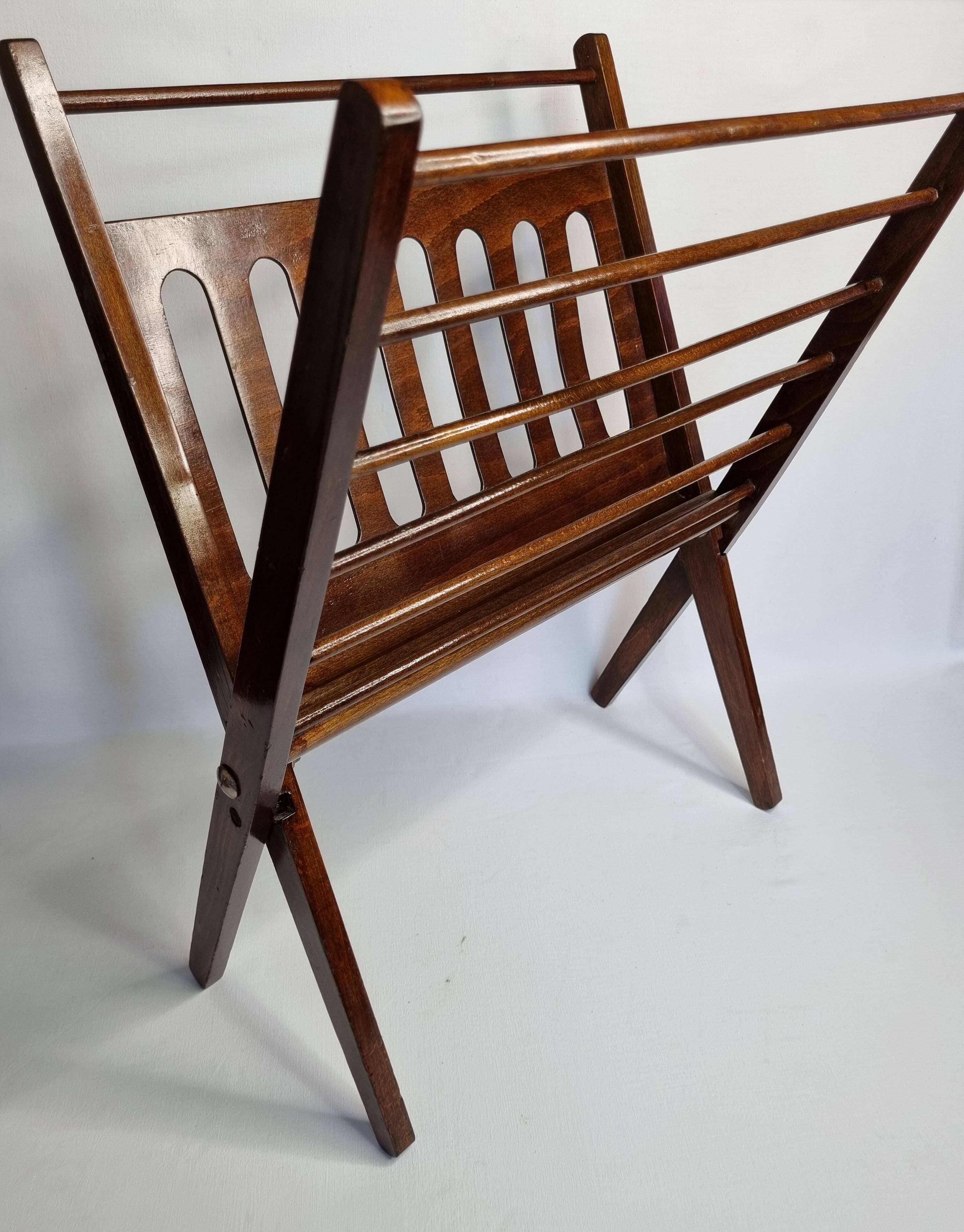 Folding teak magazine holder by Cees Braakman