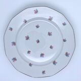 Porcelain serving dishes with small flowers and silver edging and