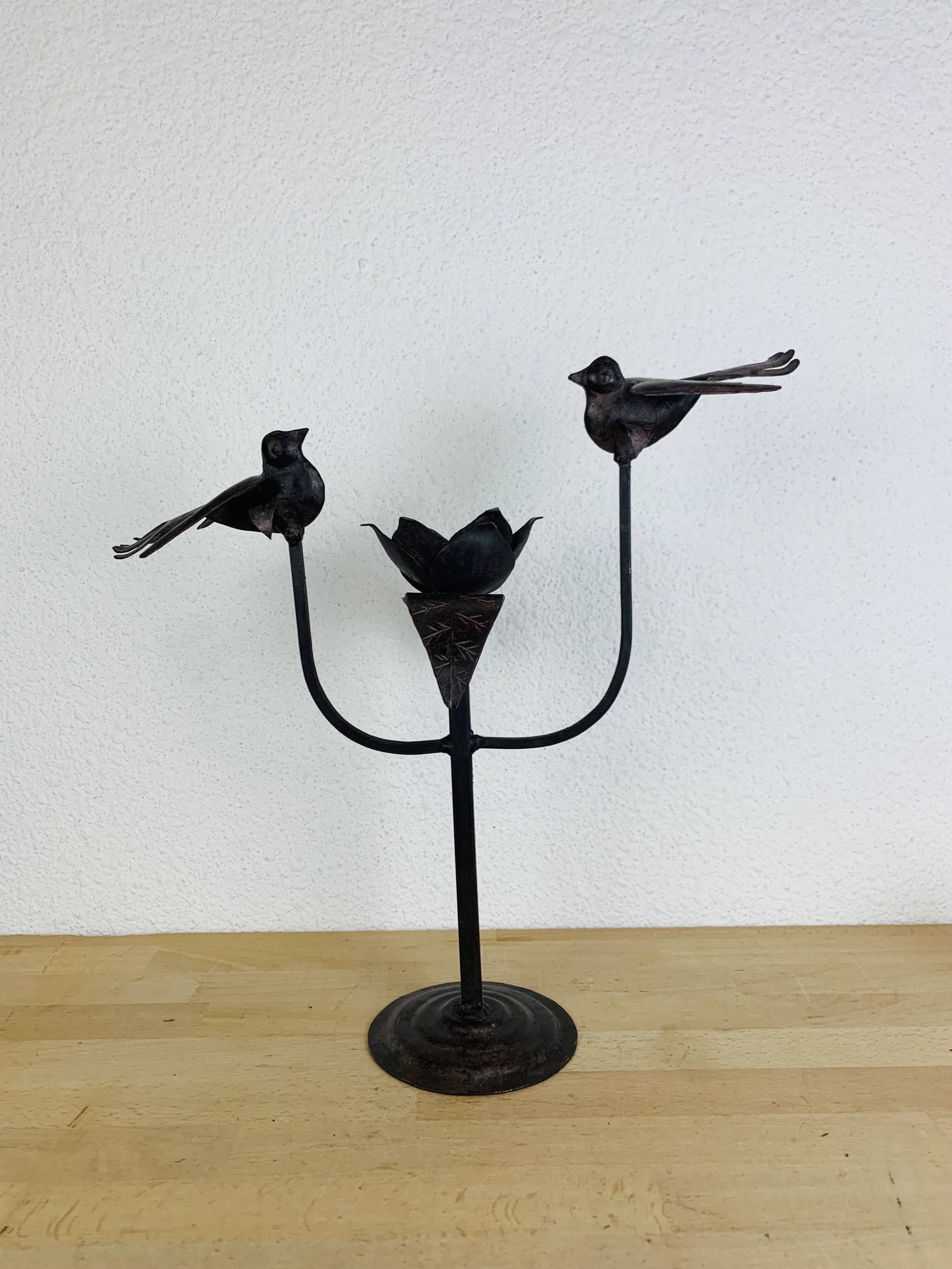 Brutalist wrought iron candle holder with birds