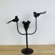 Brutalist wrought iron candle holder with birds