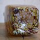 Yellow and white speckled decanter