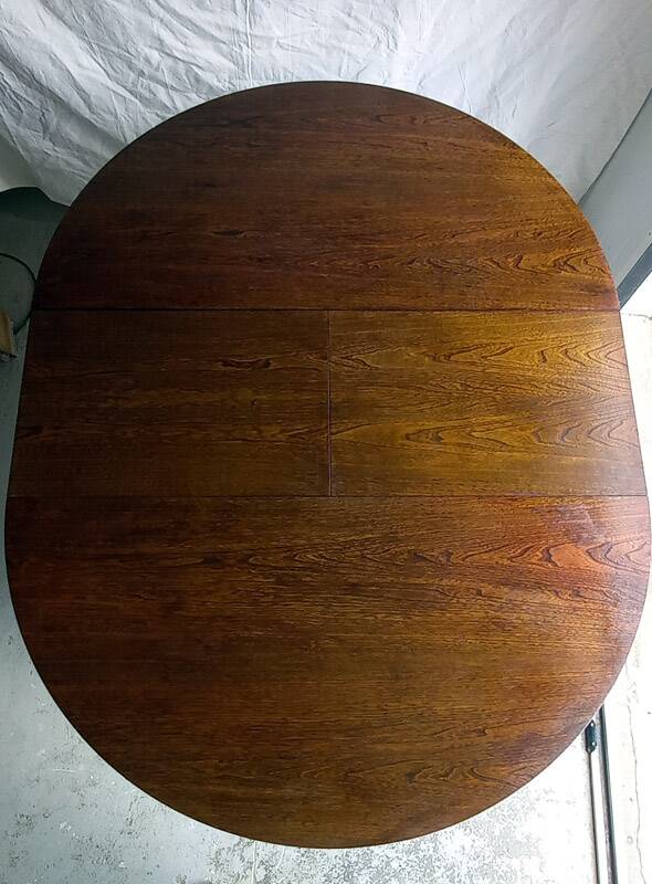 Vintage round extendable wooden table.
