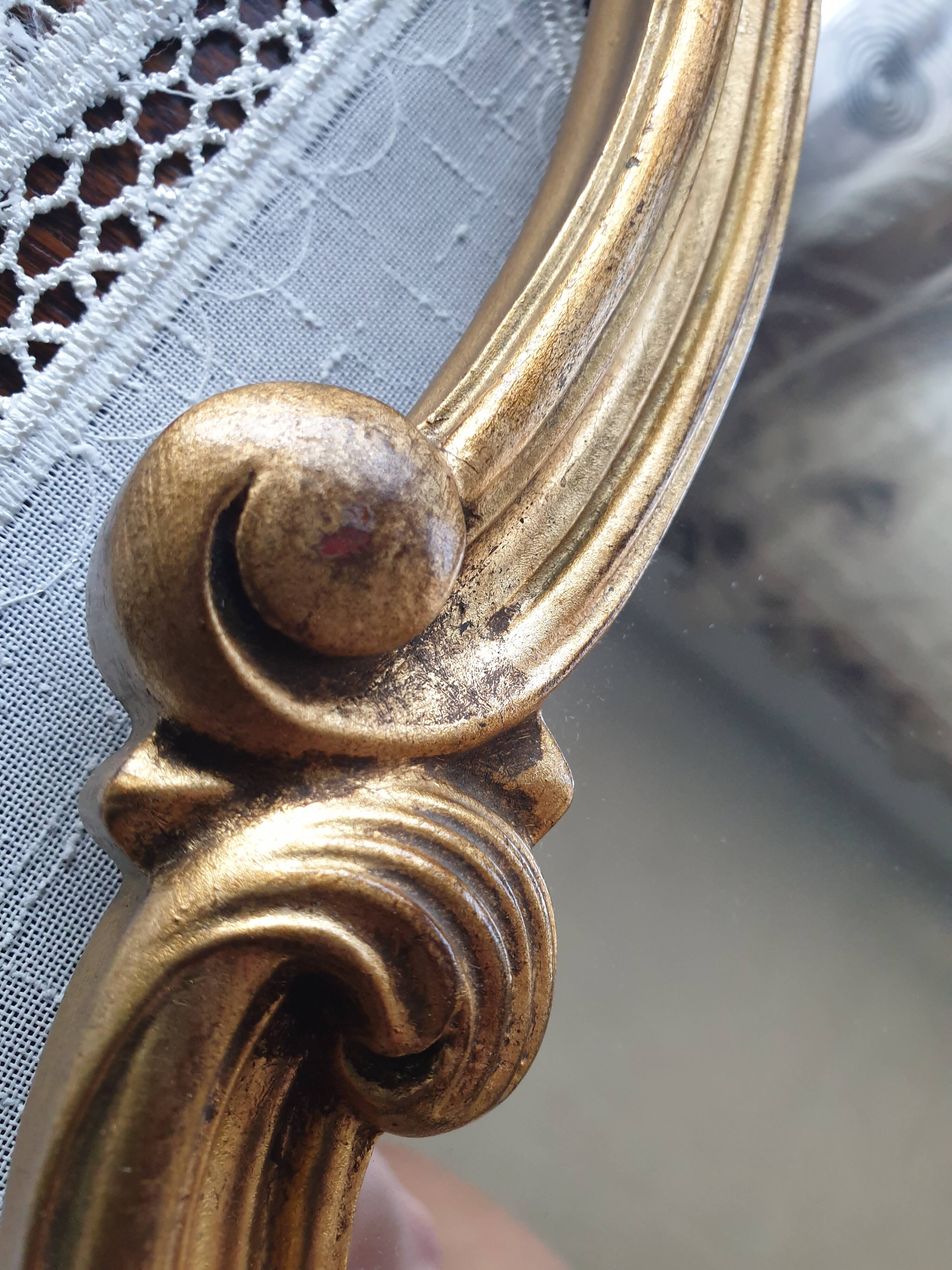 Rocaille mirror in gilded carved wood