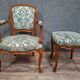 Cabriolet armchair in cherry wood with its footrest, 20th century.