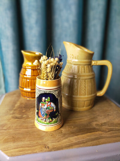 Two pitchers and a small original king beer mug