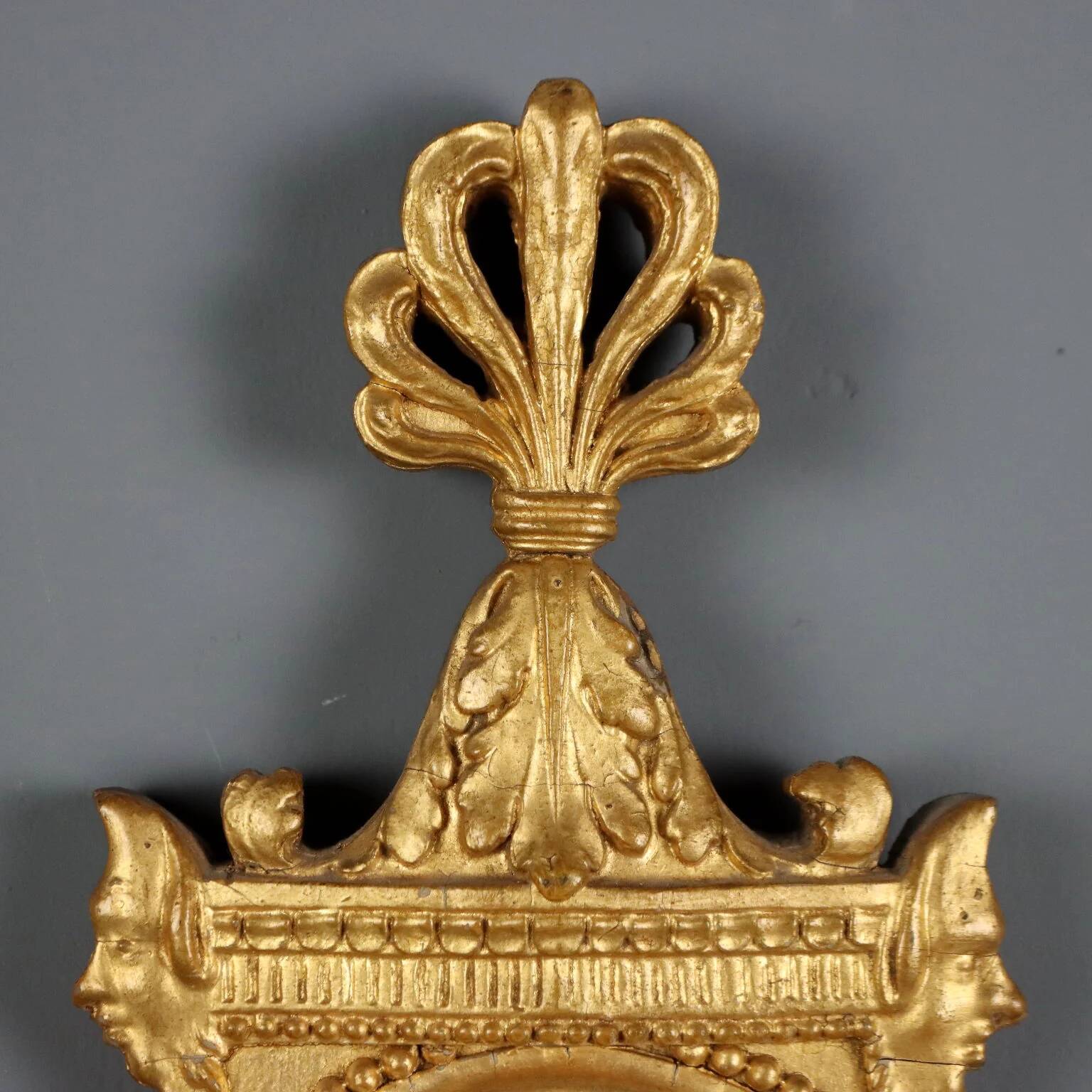 Antique neoclassical wall sconces in iron and wood, 19th century.