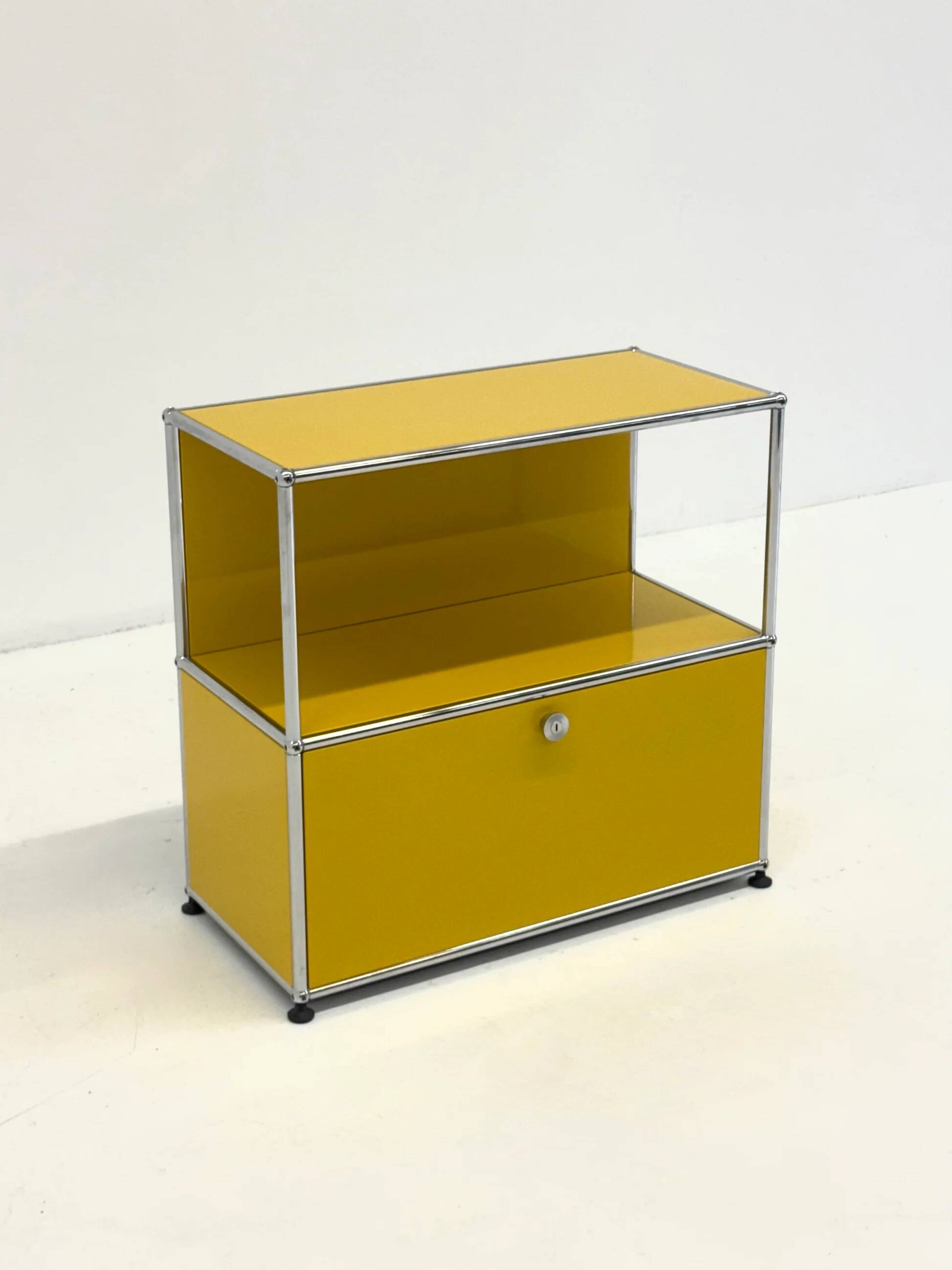 USM Haller cabinet in yellow