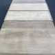 Art Deco dining table with a central pedestal, stripped in solid oak, with 2 extensions.
