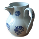 Large antique cruet in Saint Uze earthenware with blue flowers.