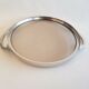 Round glass and art deco silver metal tray