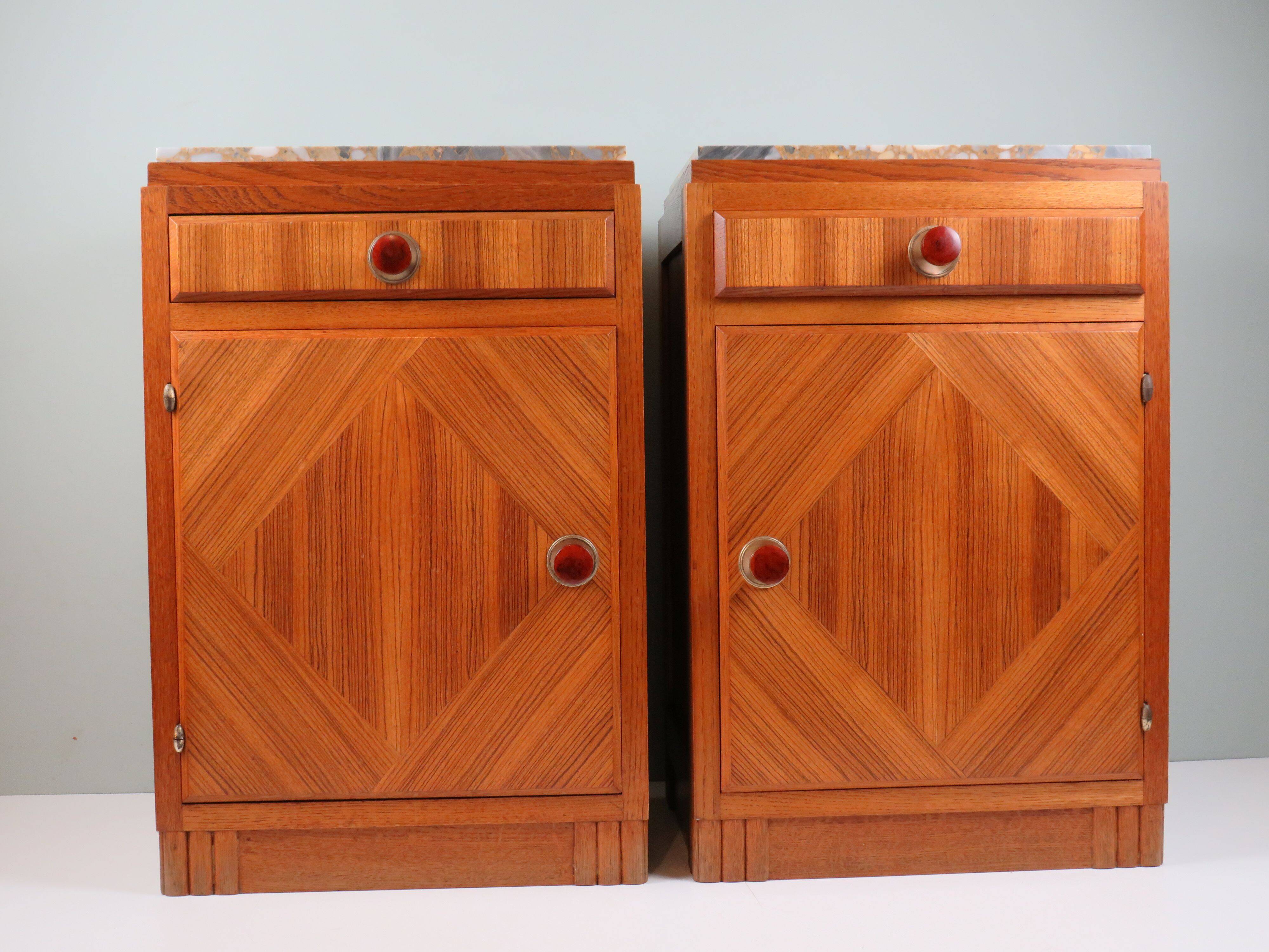 Art Deco bedside tables in oak with an inlaid marble top.