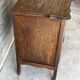 Small storage cabinet in carved oak – circa 1930