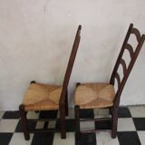 Pair of ancient mulched chairs