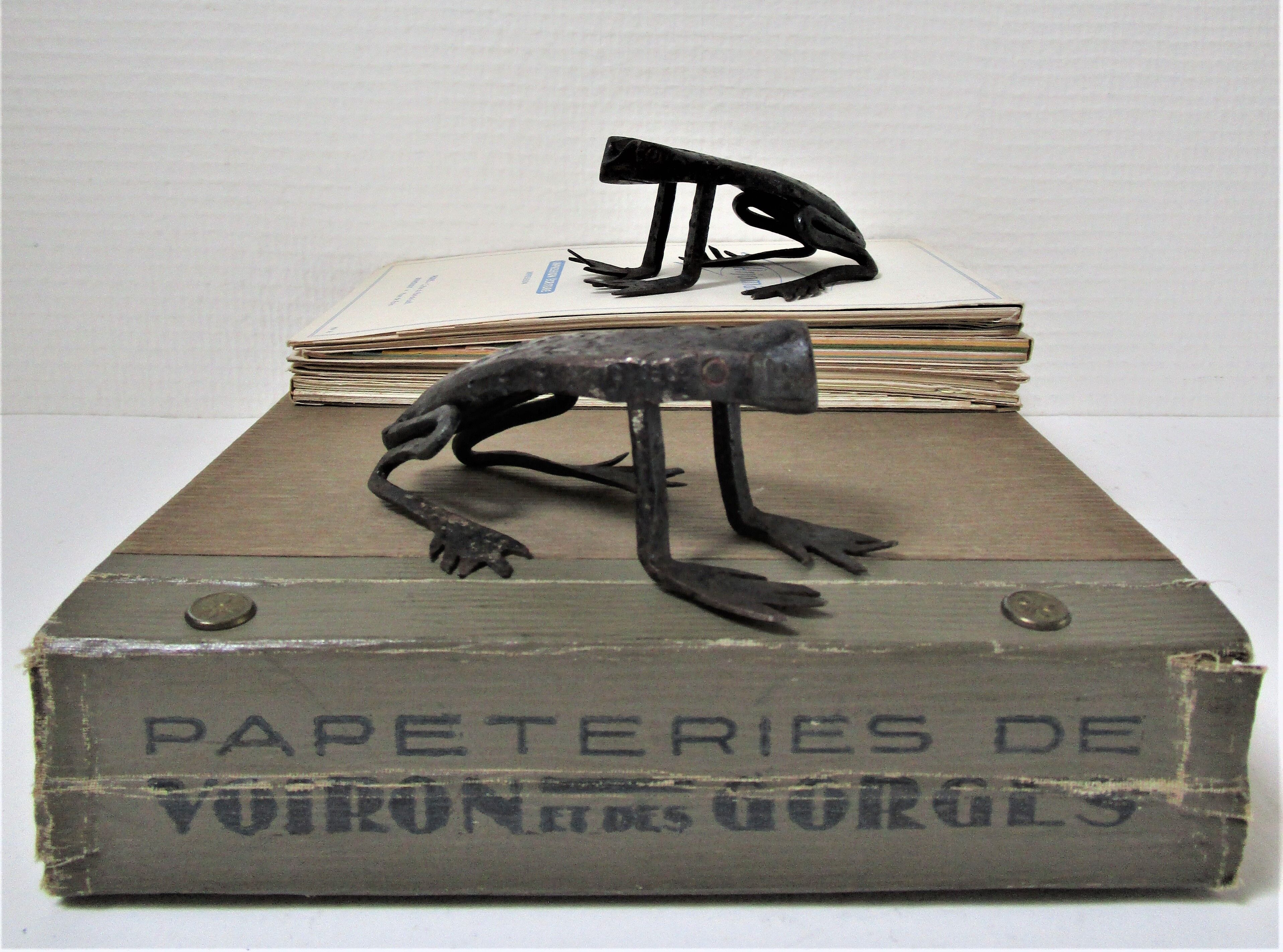Two metal clipboard frogs patinated vintage brutalist