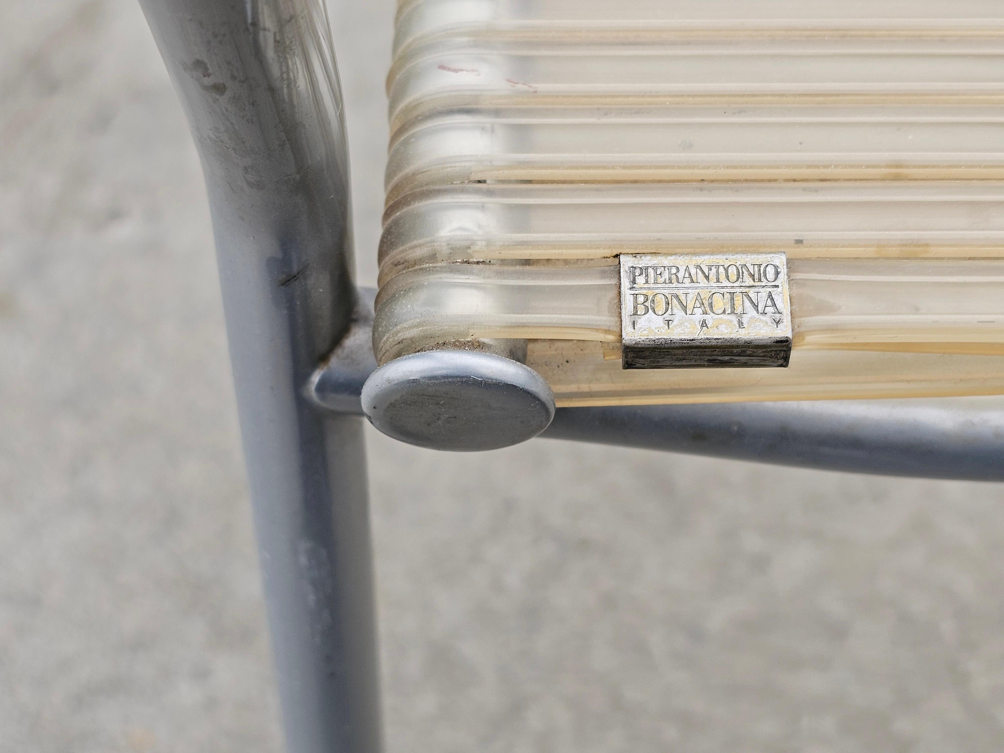 Set of 4 Miss B dining chairs by Tito Agnoli for Bonacina, 1990s.