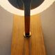 1960 wall light in gilded brass and rosewood.
