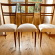 4 scandinavian chairs with seating in buckle fabrics