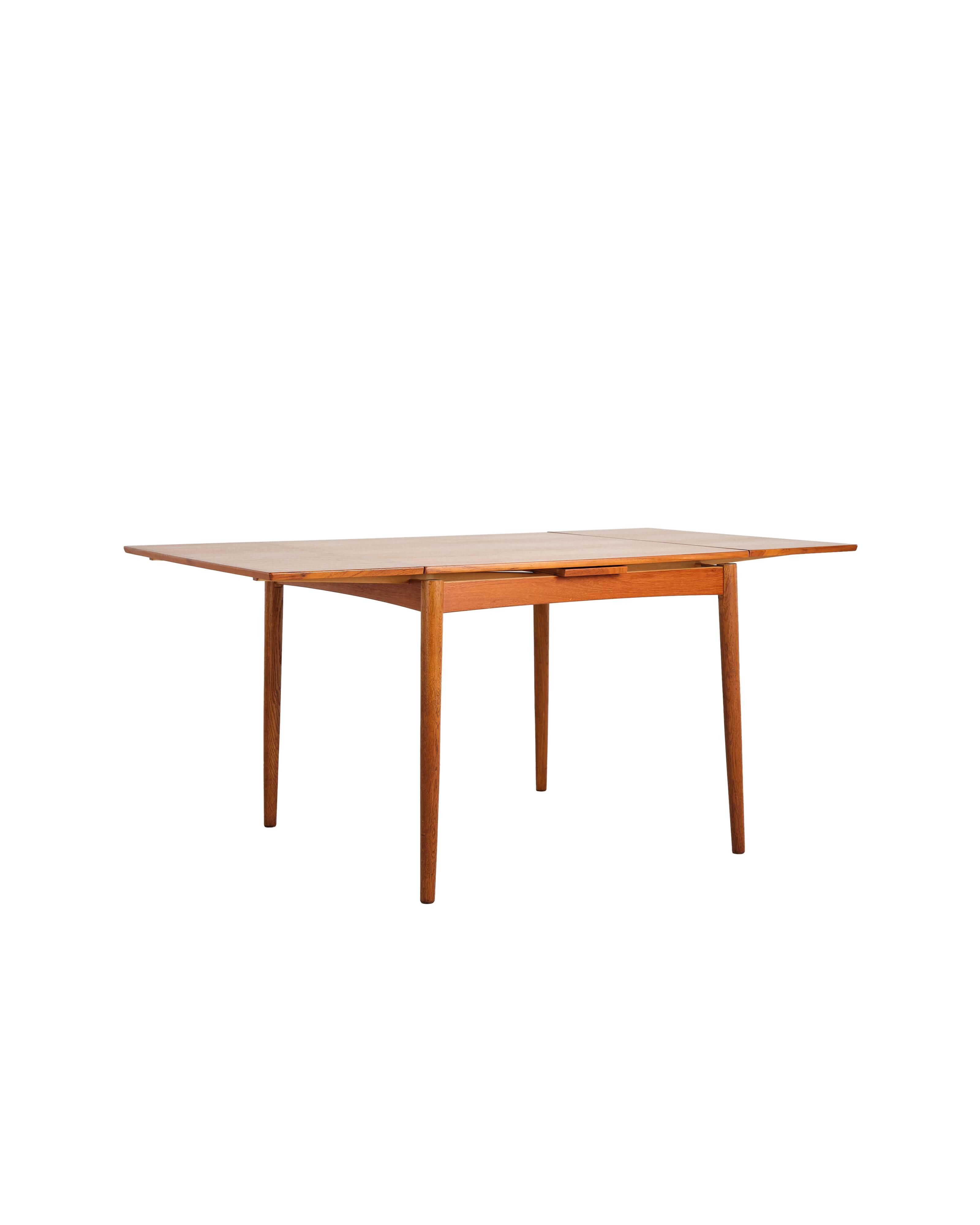 Extendable teak table by Poul Hundevad, Denmark