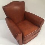 Large club chair in cognac leather