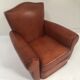 Large club chair in cognac leather
