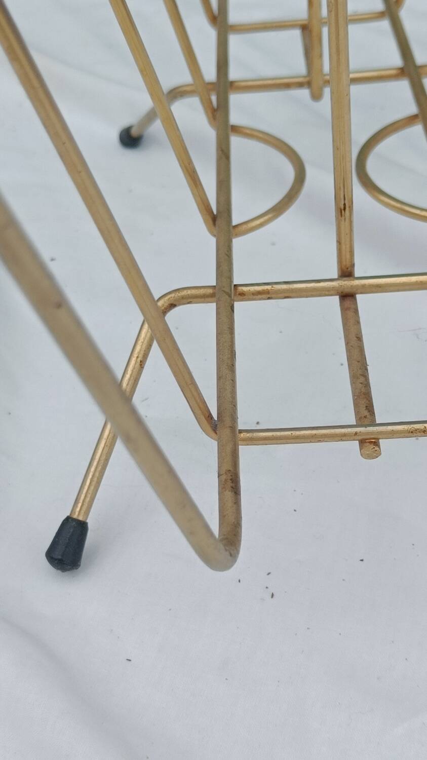 Vintage magazine rack in golden brass