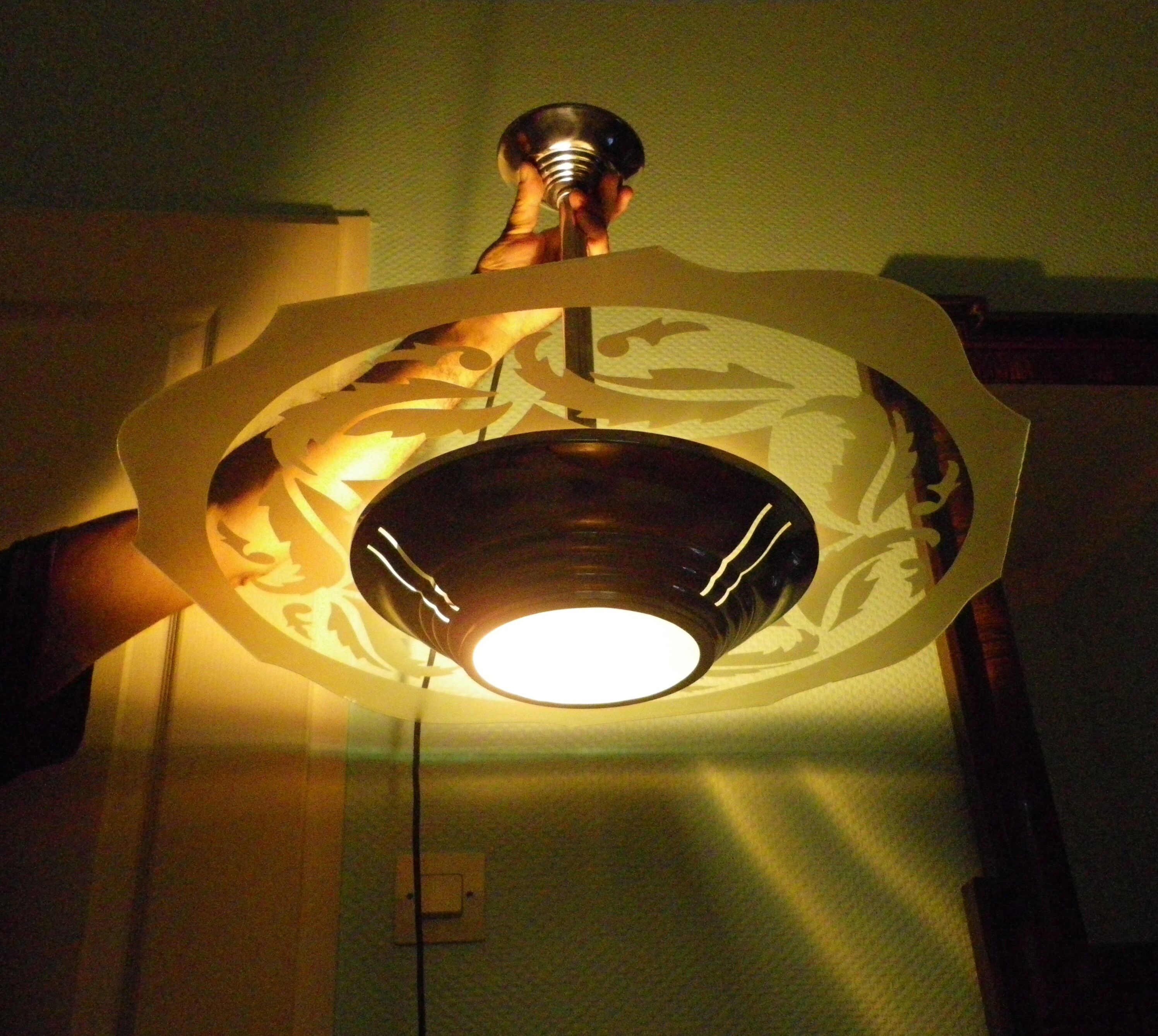 Art deco chandelier from the 1920s with transparent and opalized glass, silver metal structure