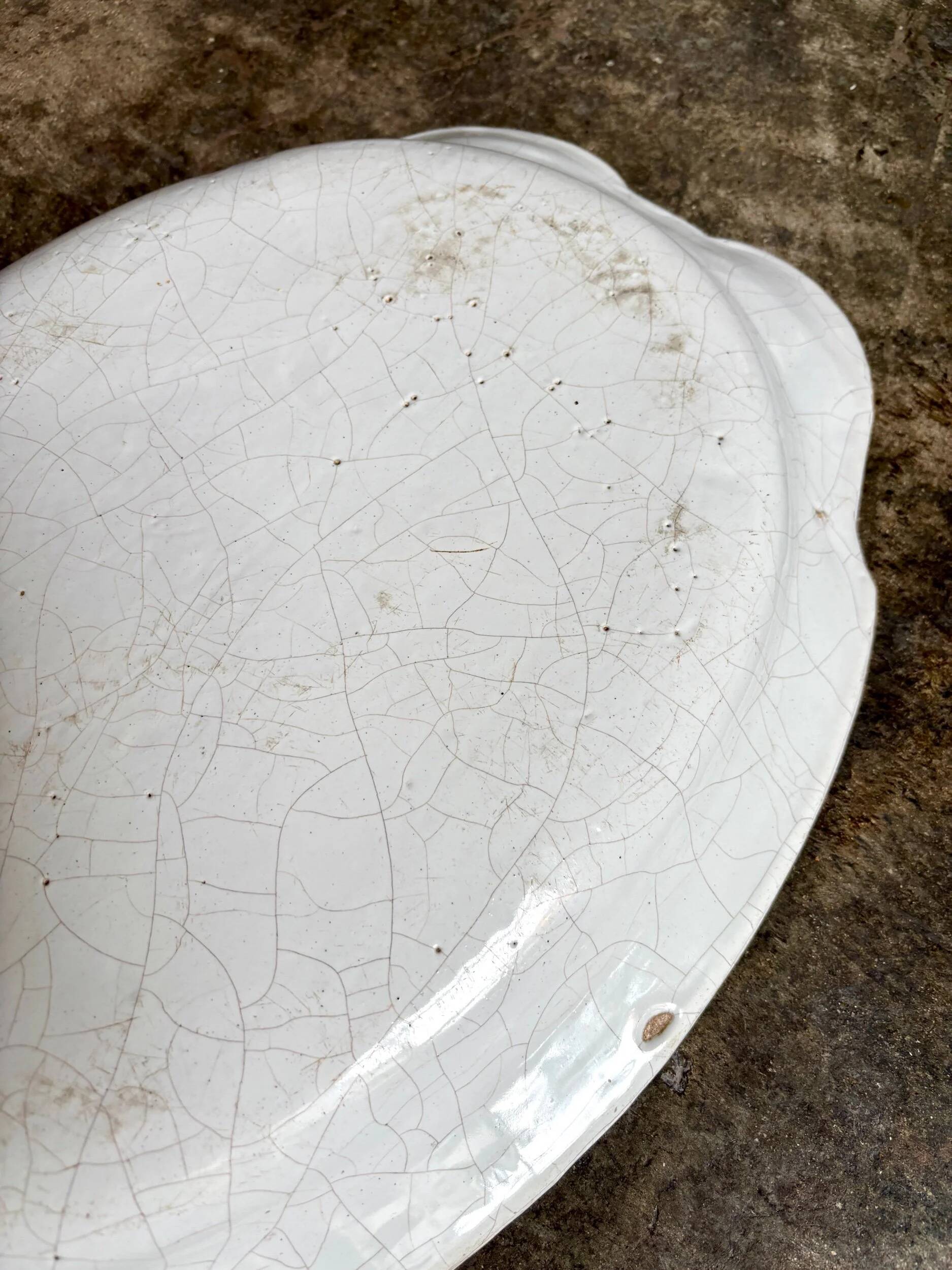 Moustiers hollow oval dish in glazed earthenware