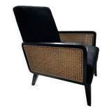 Fauteuil en velours noir et cannage