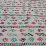 White carpet with multicolored Berber patterns handmade