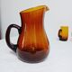 Amber glass decanter and its 5 glasses