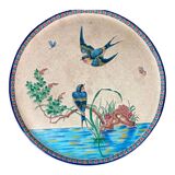 Round polychrome enamel dish with bird decoration circa 1900
