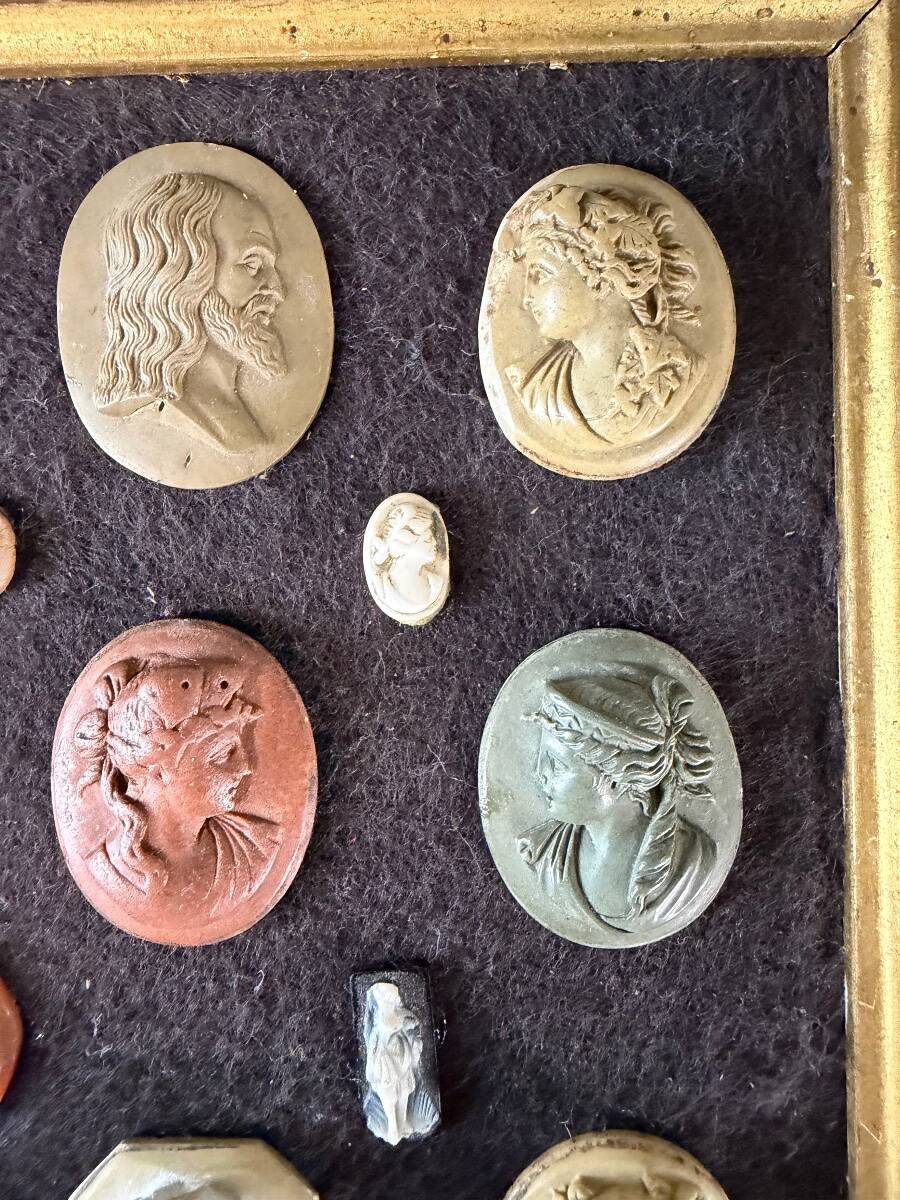 Collection of cameos and intaglios, shells and lava stones, around 1900.