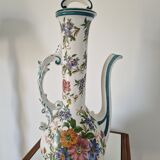 Old jug in flowered porcelain