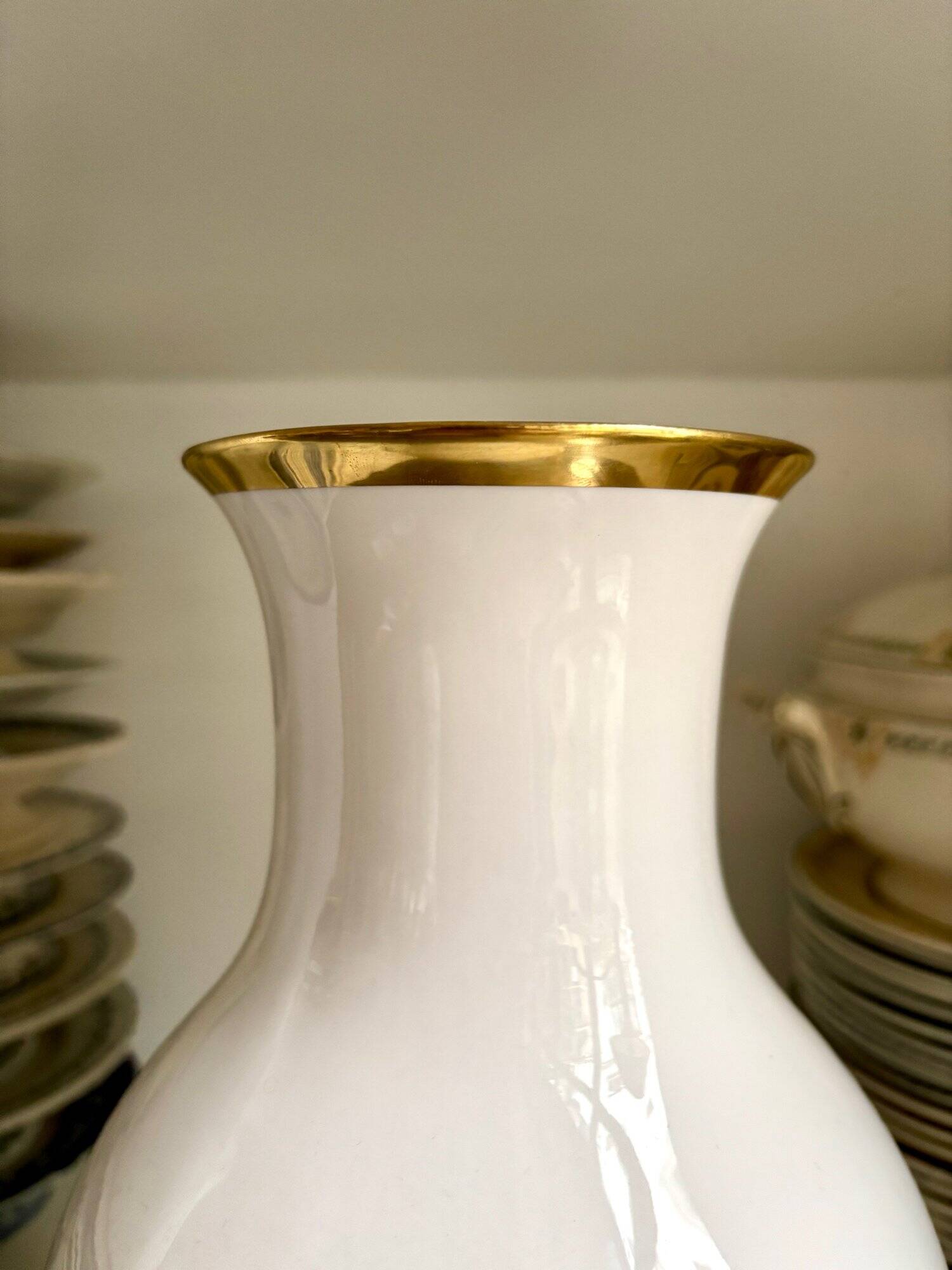 White and gold porcelain vase with black patterns by Mauricio Ortiz