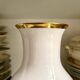 White and gold porcelain vase with black patterns by Mauricio Ortiz