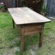 Farm table with panels with oak spindle feet. (said dairy table)