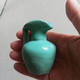 Very small turquoise soliflore in the shape of a ceramic jug