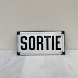 Enameled exit sign