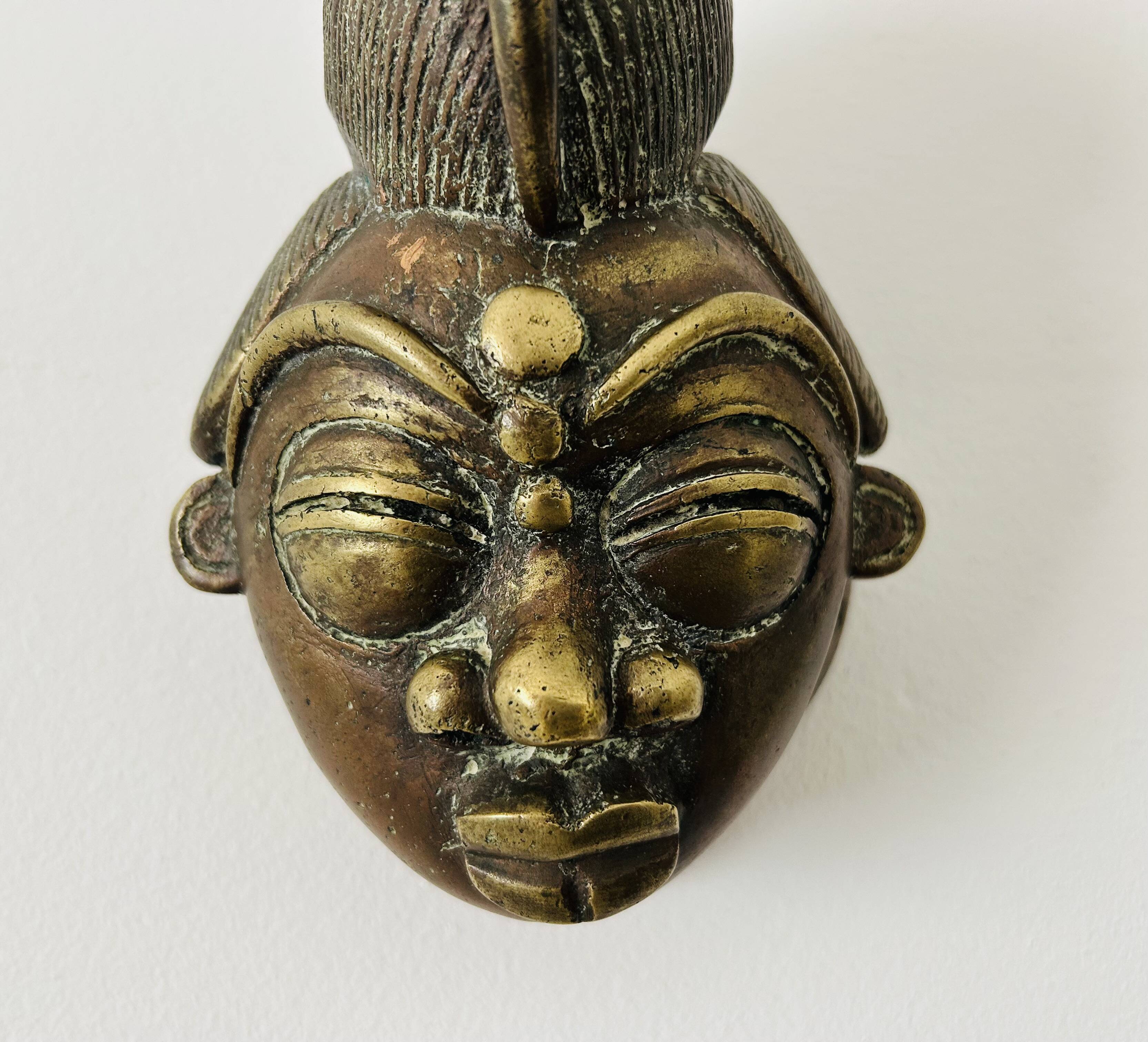 Masque en bronze africain, 19e siècle