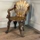 Venetian "Grotto" armchair in carved polychrome wood, silvered and gilded, circa 1890.