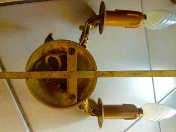 Paire d' appliques en bronze attribut de flèche et de col de cygnes