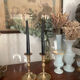Pair of brushed brass candle holders