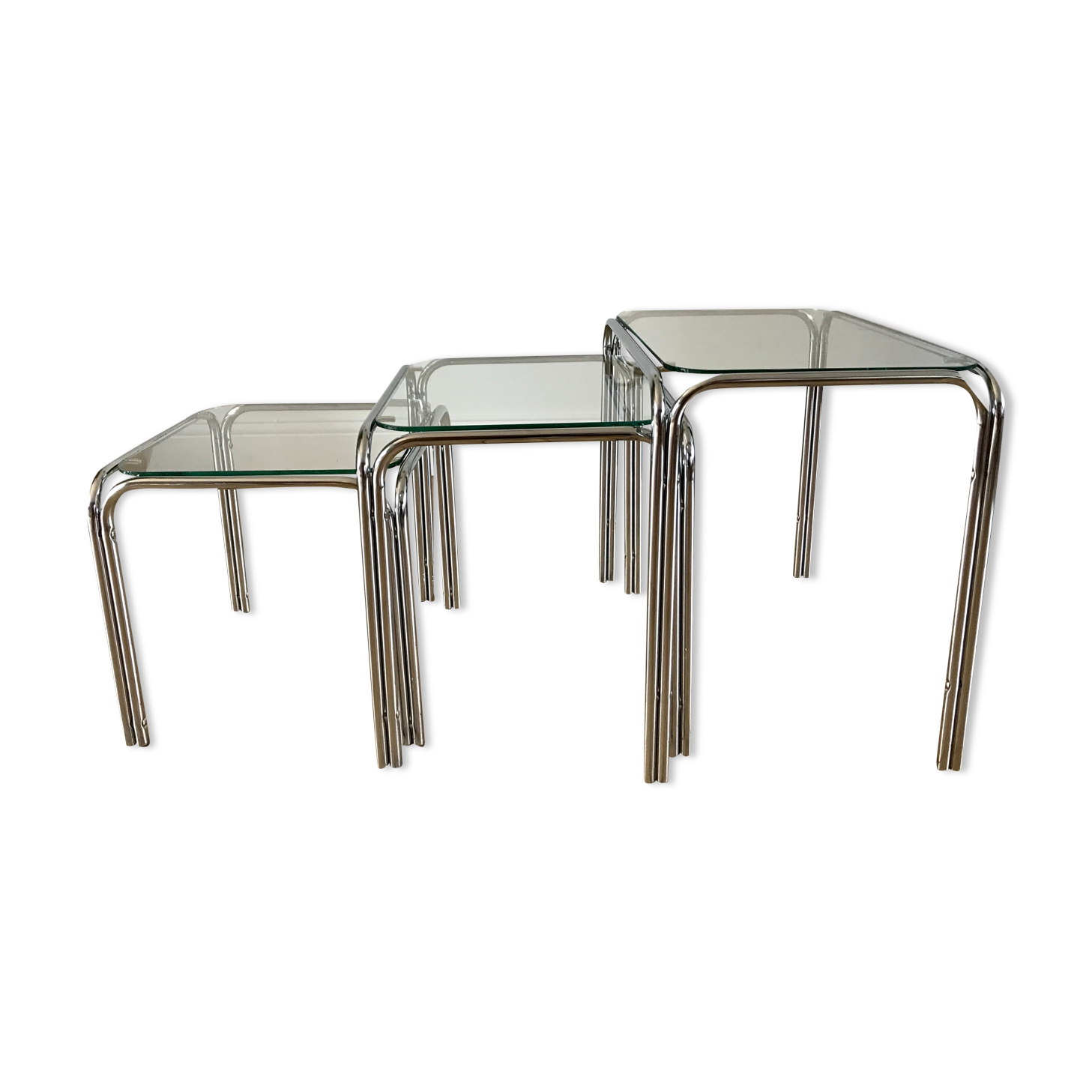 Trio of pull-out coffee tables in glass and chrome metal 70s