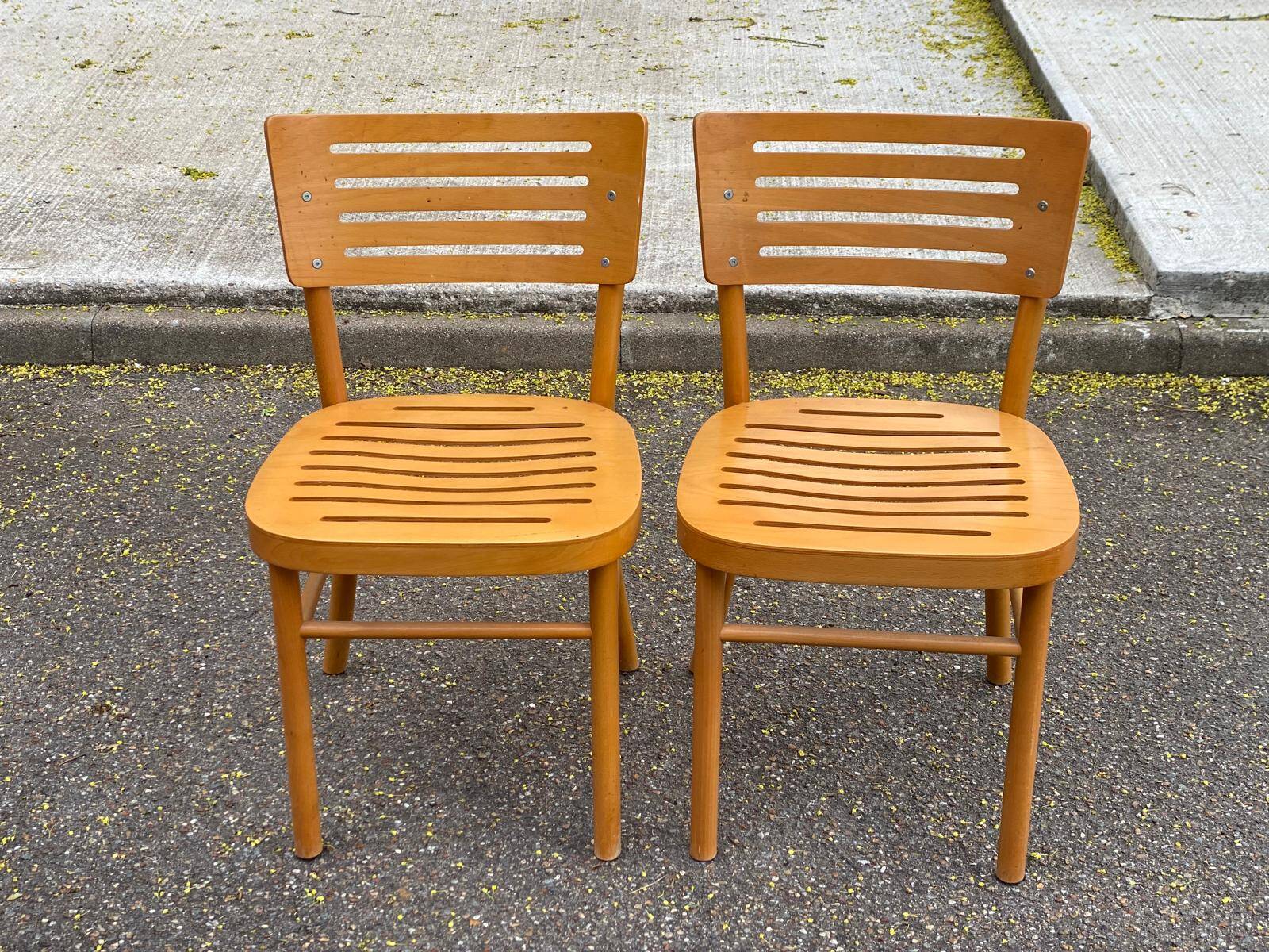 2 Scandinavian bistro chairs from Ikea, Balser, made of curved solid wood, 1999.